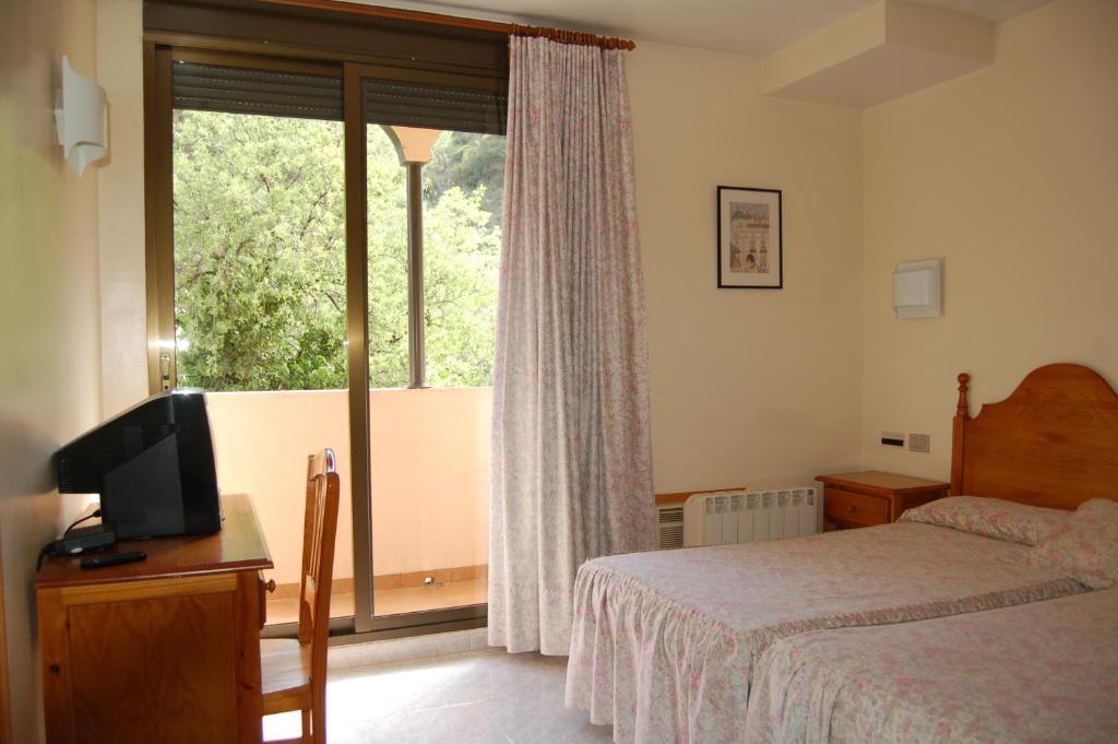 Hotel Llucena Lucena del Cid Phòng bức ảnh